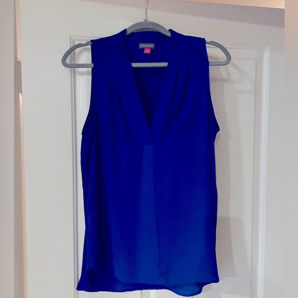 Beautiful blue, sleeveless blouse.